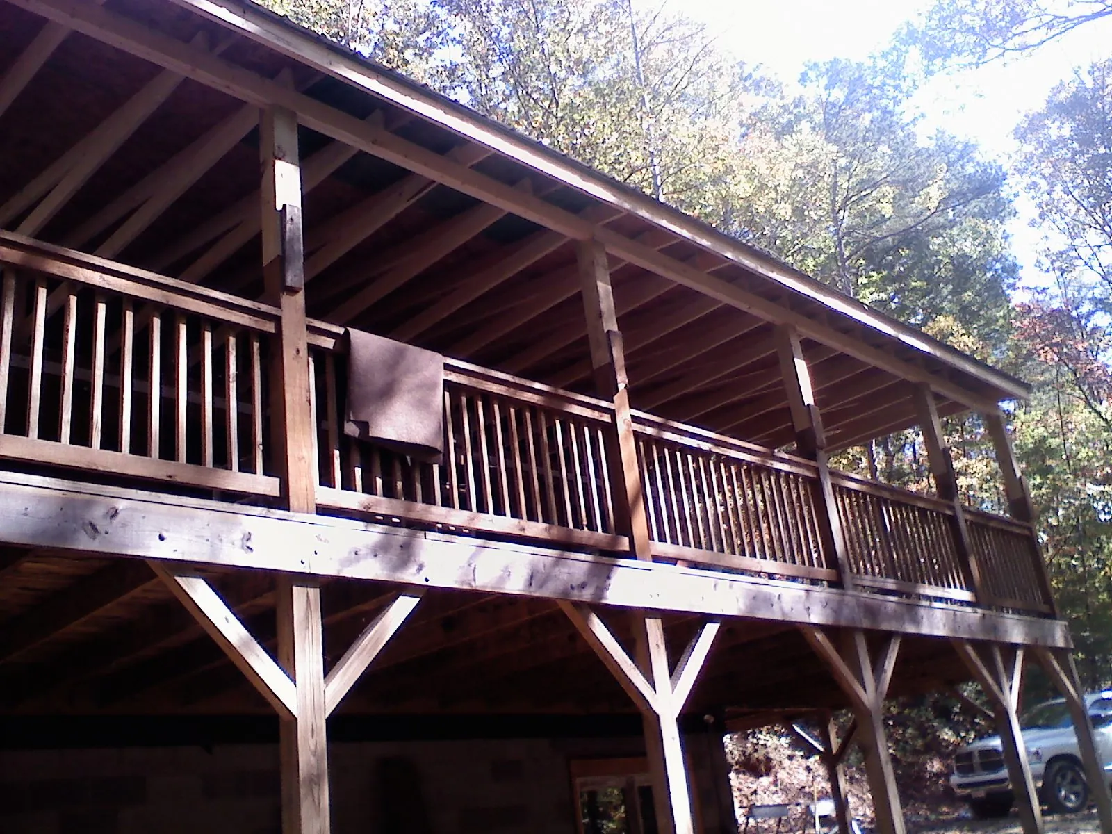 Timber framing under a new elevated porch and deck — Roof Leak Repair in East Saint Louis by Roofing Brothers